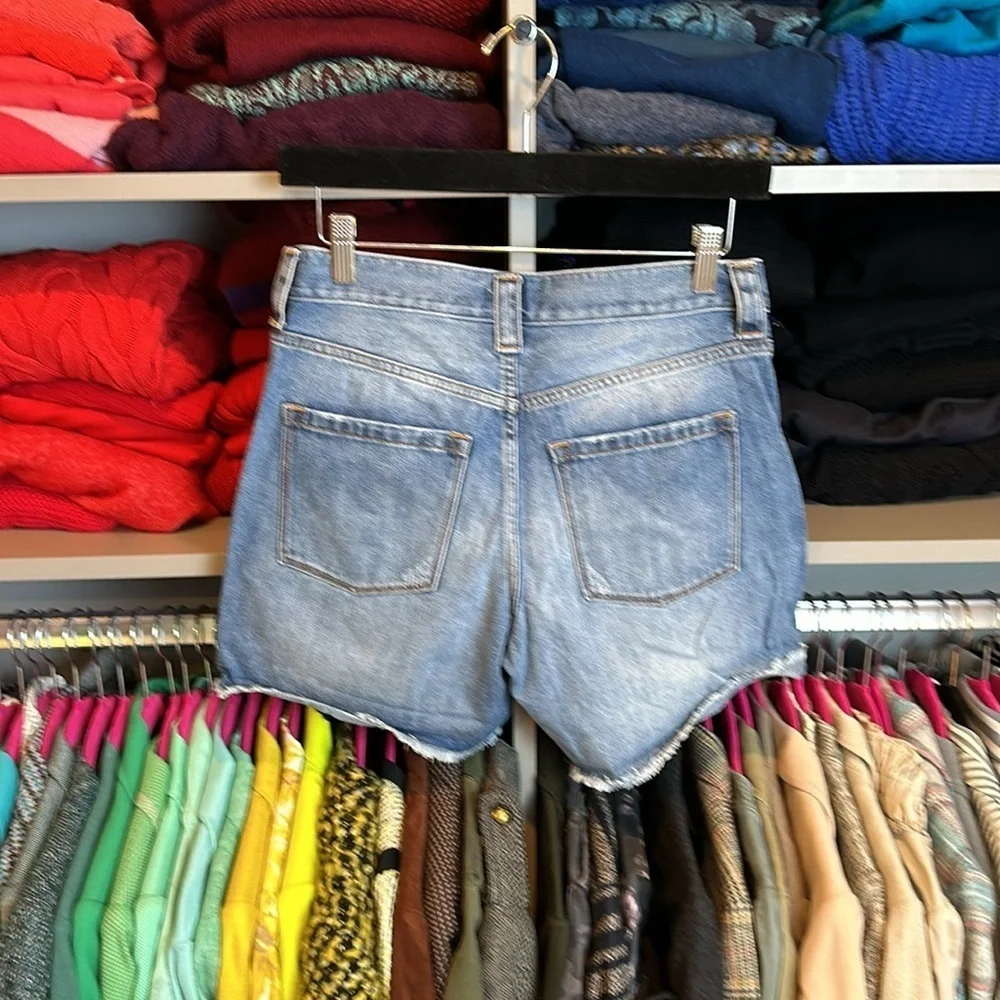 J Crew blue distressed raw hem jean shorts size 25